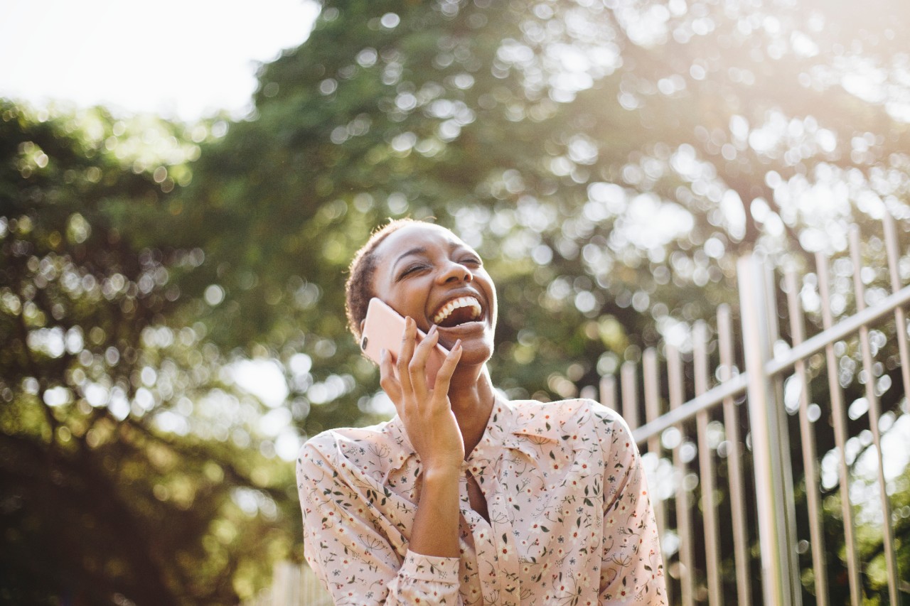 Happy woman on the phone